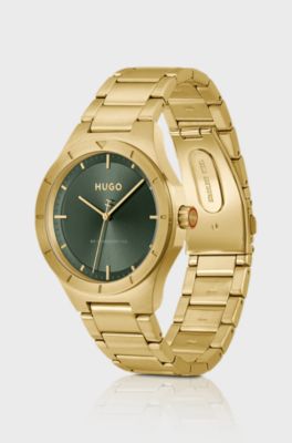Lit gold-tone watch with green dial, Gold tone