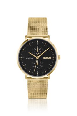 Style gold-tone watch with black dial, Gold tone