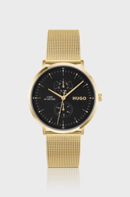 Style gold-tone watch with black dial, Gold tone