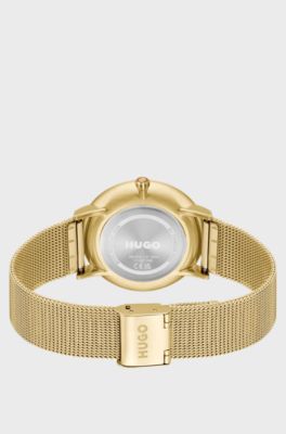 Style gold-tone watch with black dial, Gold tone