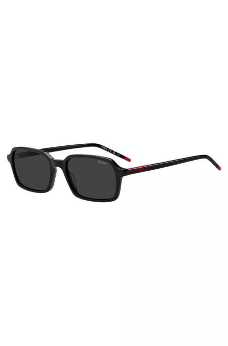 Black-acetate sunglasses with red trims