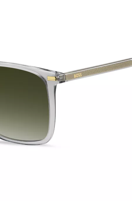 Grey-acetate sunglasses with green-shaded lenses
