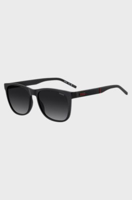 Matte-black sunglasses with patterned temples, Black