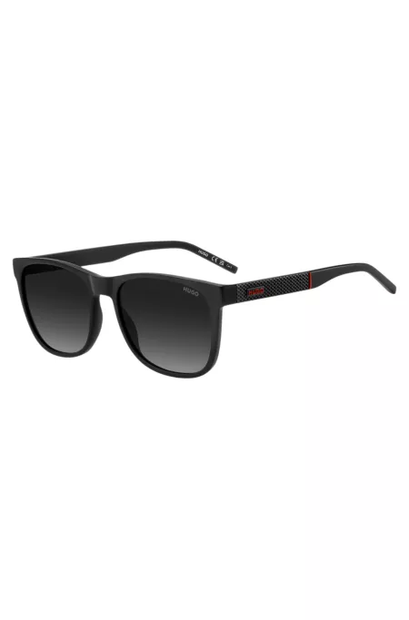 Lunettes de soleil noires et mates avec branches à motif