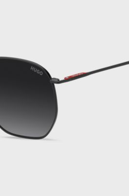 Matte-black sunglasses in stainless steel with red details, Black