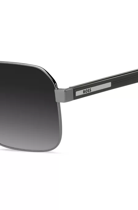 Lunettes de soleil en acier gris à double pont et branches transparentes