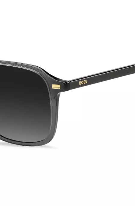 Sunglasses in dark-grey acetate with gold-tone logos