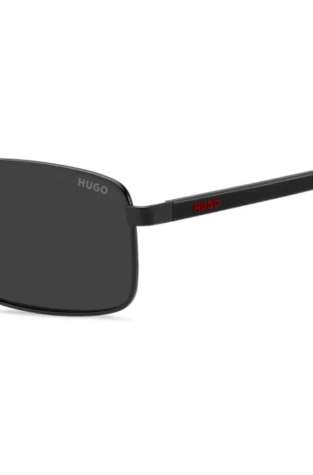 Stainless-steel sunglasses with black and red temples