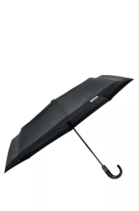 Parapluie de poche gris foncé à chevrons avec poignée en similicuir