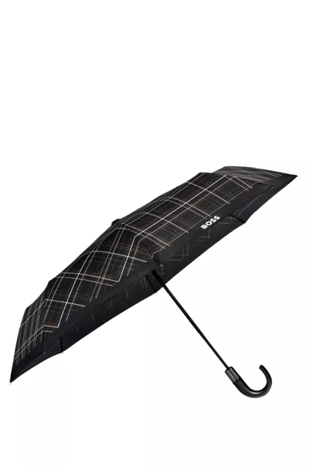 Parapluie de poche à carreaux noirs avec poignée en similicuir