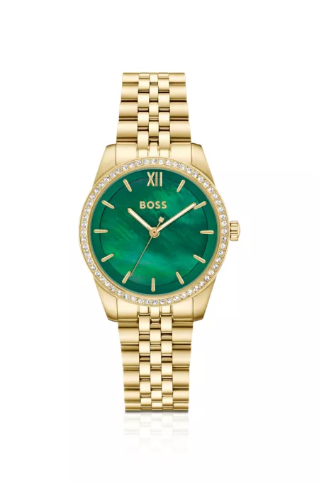 Graceful green-dial watch with crystal-set bezel