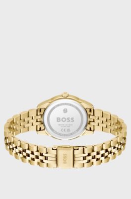 Graceful green-dial watch with crystal-set bezel, Gold tone