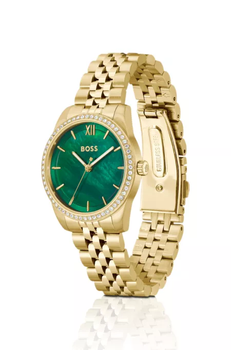 Graceful green-dial watch with crystal-set bezel