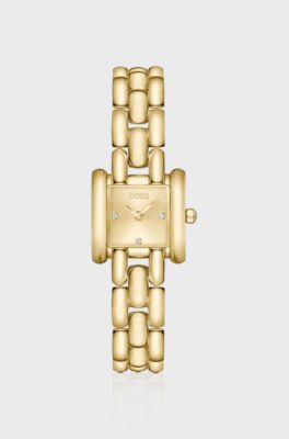 Violet square gold-tone watch with sculptural bracelet, Gold tone
