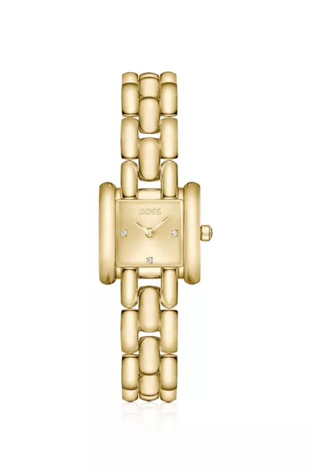 Violet square gold-tone watch with sculptural bracelet