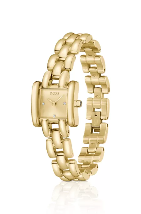 Violet square gold-tone watch with sculptural bracelet
