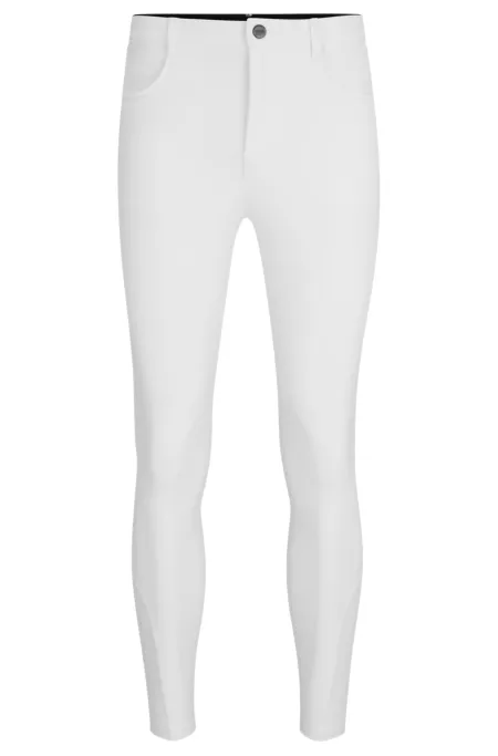 Equestrian knee-grip breeches in power-stretch material