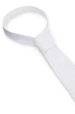 T&auml;vlingsslips f&ouml;r ridning av enf&auml;rgat v&auml;vt tyg, Vit