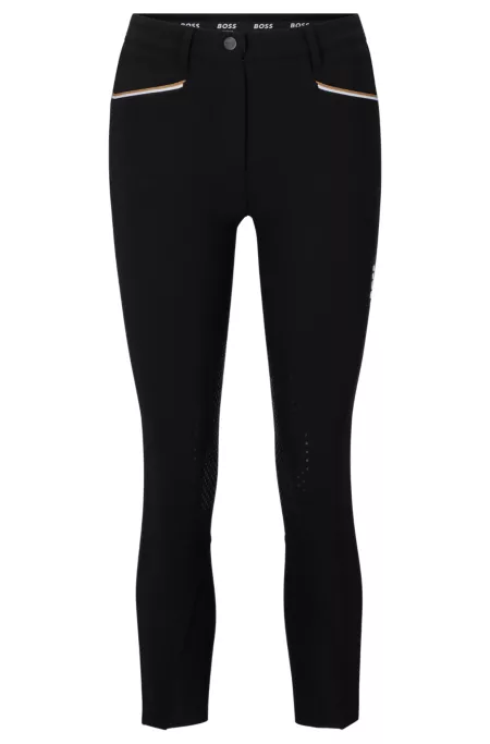 Equestrian knee-grip breeches in power-stretch material