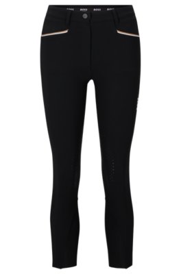Equestrian knee-grip breeches in power-stretch material