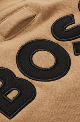 Hunde-Hoodie aus Baumwoll-Mix mit Kontrast-Logo, Beige
