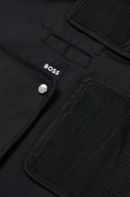Dog raincoat in waterproof fabric with contrast logo, Black