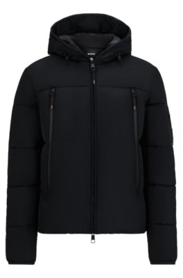 Equestrian hooded puffer jacket with fleece-lined pockets