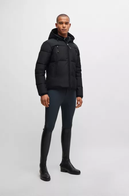 Equestrian hooded puffer jacket with fleece-lined pockets