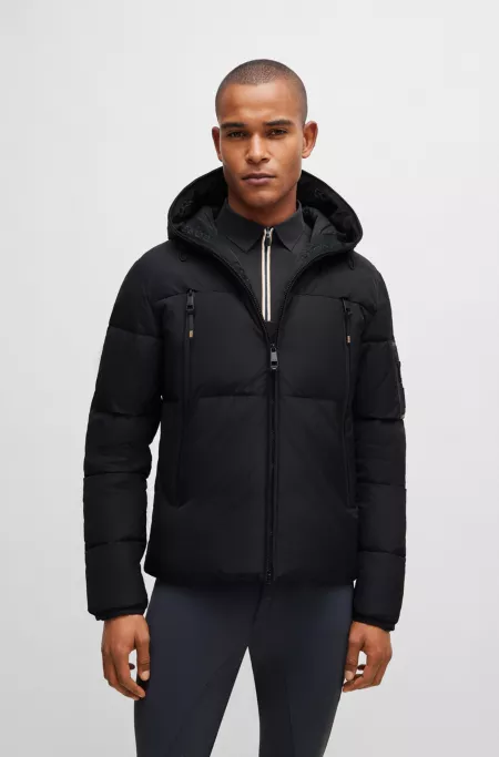 Equestrian hooded puffer jacket with fleece-lined pockets