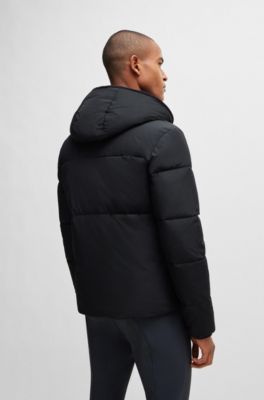 Equestrian hooded puffer jacket with fleece-lined pockets, Black