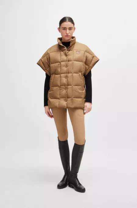Equestrian down cape with fleece-lined pockets