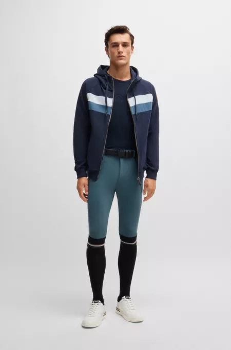 Equestrian knee-grip breeches with four-way stretch