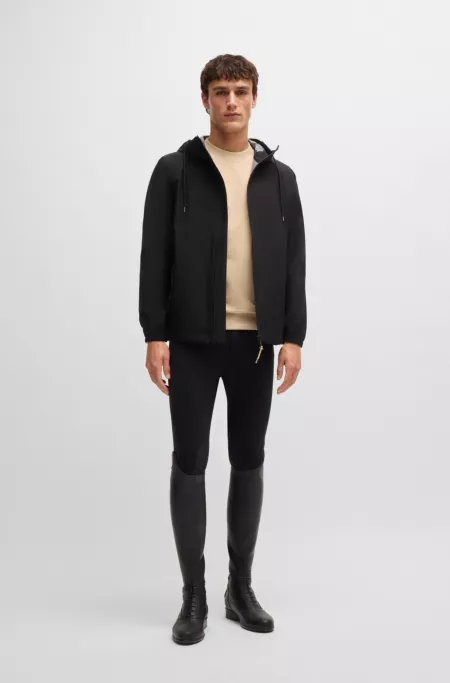 Equestrian waterproof jacket with signature stripe