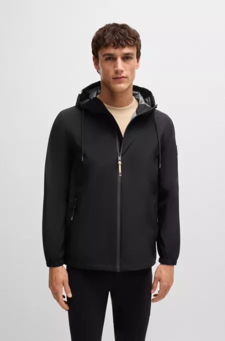 Equestrian waterproof jacket with signature stripe