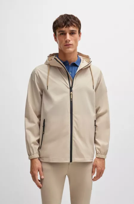 Equestrian waterproof jacket with signature stripe