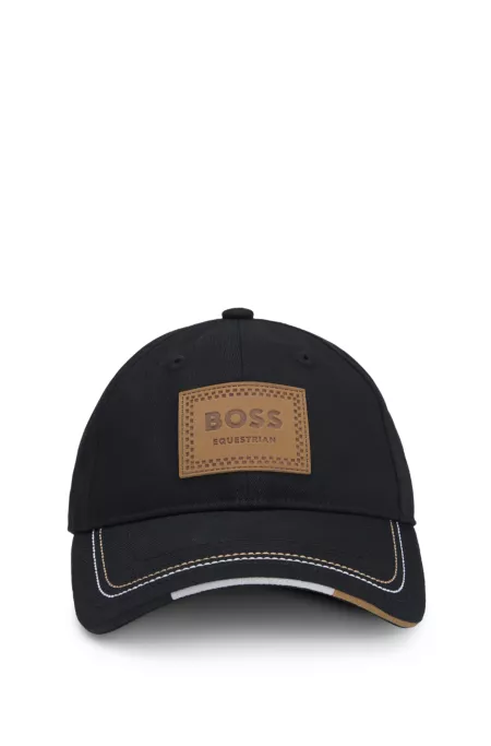 Equestrian cap with retro-inspired logo patch