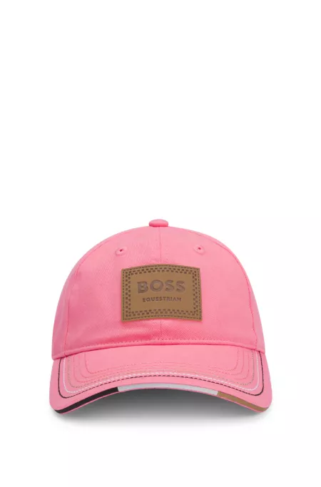 Equestrian cap with retro-inspired logo patch