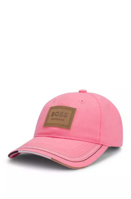 Equestrian cap with retro-inspired logo patch