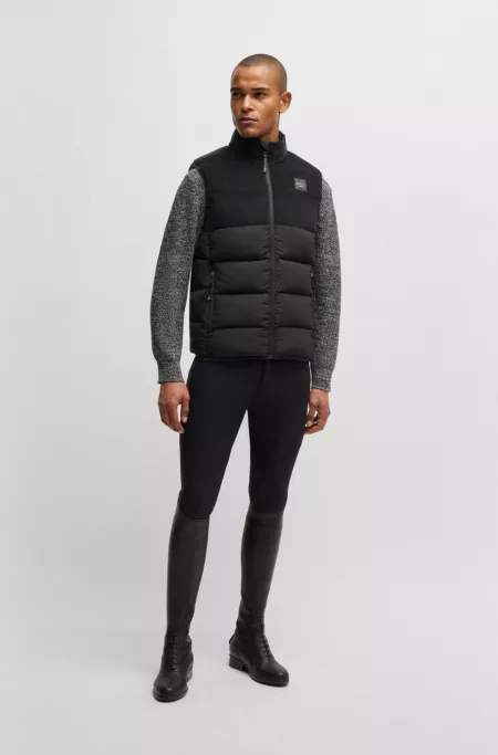 Equestrian waterproof padded gilet with corduroy panel
