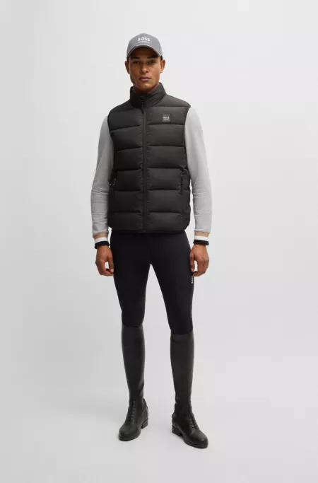 Equestrian waterproof padded gilet with corduroy panel