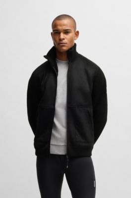 Veste d&rsquo;&eacute;quitation en similicuir su&eacute;d&eacute; avec finitions en maille, Noir