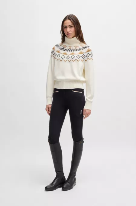 Equestrian rollneck sweater with knitted pattern