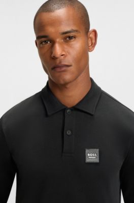 Gebreide polo voor ruiters met logopatch, van stretchkatoen, Zwart