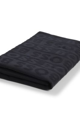 Cotton beach towel with sculpted logo, Black