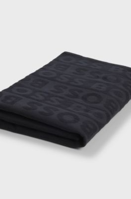 Cotton beach towel with sculpted logo, Black