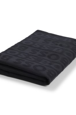Drap de plage en coton à logo sculpté