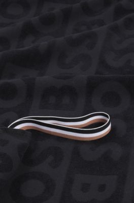 Cotton beach towel with sculpted logo, Black