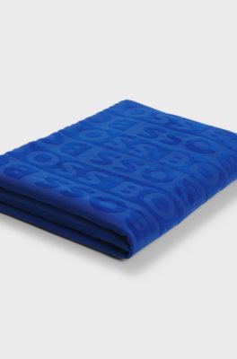 Cotton beach towel with sculpted logo, Blue