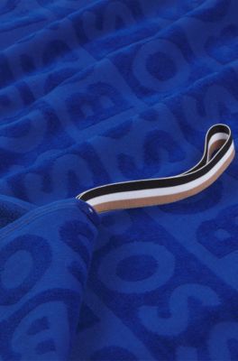Cotton beach towel with sculpted logo, Blue