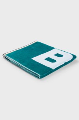 Cotton beach towel with logo and signature stripes, Dark Green